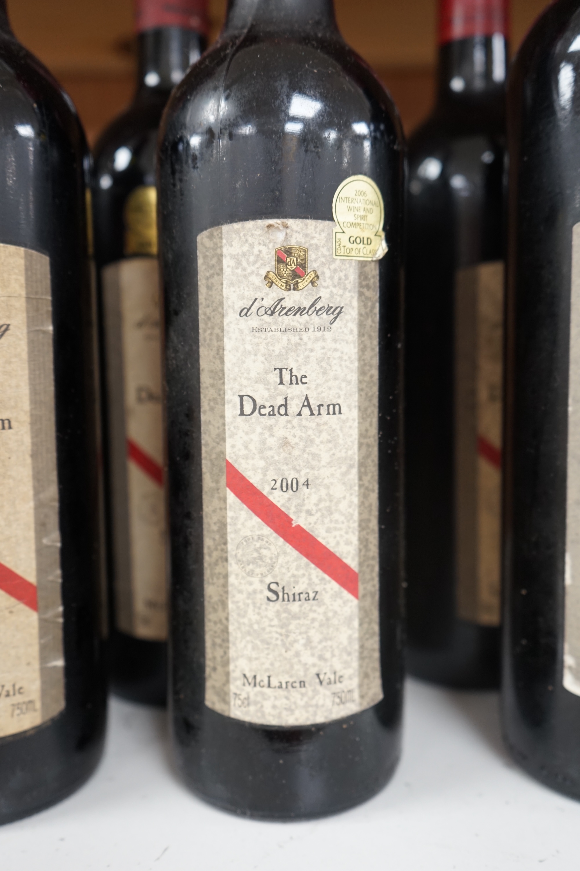 Twelve bottles of d’Arenberg McLaren Vale The Dead Arm Shiraz, for the years. 2000; 2001 (2); 2002 (2); 2003 (3); 2004 (2) and 2005 (2). Condition - fair to good, storage history unknown